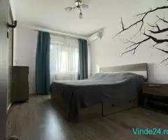 Apartament decomandat cu 3 camere, 2 bai +2 locuri de parcare